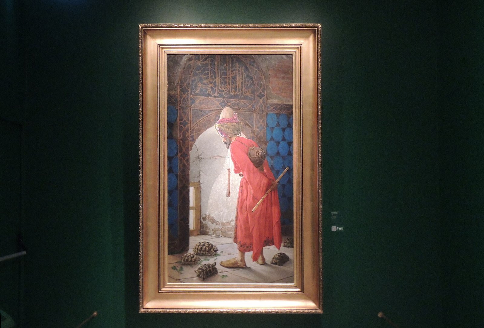 Schilderij van een man in Ottomaans gewaad tussen kruipende schildpadden